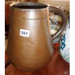 Large old 18th c. copper vessel with seamed body and loop handle, approx 12" high