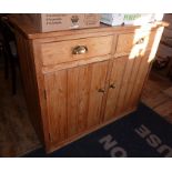 Farmhouse pine two door cupboard with two drawers over