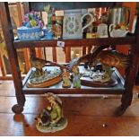 Two shelves of assorted bird figures, Wedgwood etc.