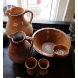 Two Verwood Pottery earthenware large jugs, together with a rare barber's or shaving bowl and two