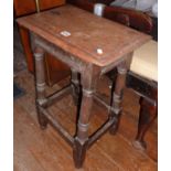 19th c. oak joint stool having turned legs with stretchers and extended feet, 25" high