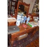 Late Victorian pine dressing table with mirror over and two drawers under with decorative carved