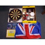 A good mixed lot to include a Winmau bristle dartboard in original box, a quantity of pub ashtrays,