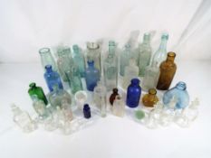 A quantity of vintage glass bottles and similar - This lot MUST be paid for and collected,