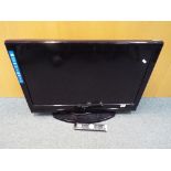 A Sanyo HD Ready 32"television with remote control, model No. CE32LD90-B.