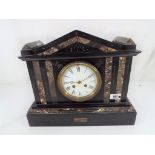 A French black slate and marble mantel clock of architectural form with pendulum and key, 30.