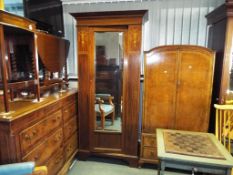 A good quality single door mirrored wardrobe with detailed inlay,