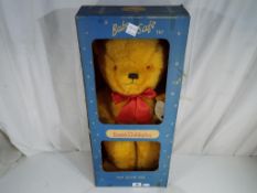 A large Deans Childsplay teddy bear in original box, approximately 60 cm (h).