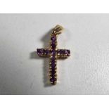 A hallmarked 9 carat gold and amethyst cross - This lot MUST be paid for and collected,