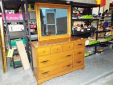 A six drawer chest of drawers with mirror by Ethan Allen,