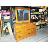 A six drawer chest of drawers with mirror by Ethan Allen,