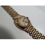 Rotary - a gentleman's wristwatch and bracelet, the watch case of yellow metal and marked 12543,