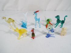 A set of eight Murano glass animal miniature figures and one bone carved animal - This lot MUST be