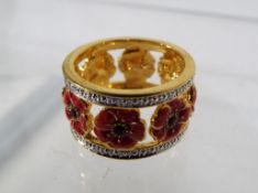 A ring by Bradford Exchange depicting a poppy.