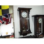 A slim Vienna-styled wall clock two-train gong striking movement,