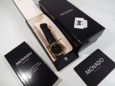 A gentleman's Museum wristwatch by Movado, plain black dial with single accent at the 12 o'clock,
