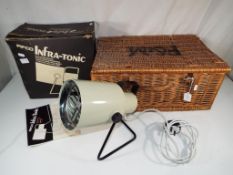 A Fortnum and Mason picnic basket and a Pifco Infra - Tonic lamp in original box (2) - This lot