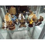 A quantity of ceramic Japanese figurines and Buddha - This lot MUST be paid for and collected,