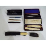 Five vintage cut-throat razors in cases,