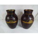 A pair of antique Japanese vases circa 1900 signed to the base, approximately 22 cm (h) (2).