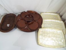 A good quality wooden revolving hors d'oeuvre tray,