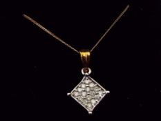 A 9 carat gold 15 point diamond square cluster pendant, approx 1.