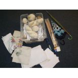 A mixed lot to include a quantity of wool, vintage linen, knitting needles,