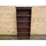 A large free standing priory linenfold fronted bookcase, approximately 187 cm x 78 cm x 29 cm.