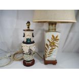 Two ceramic table lamps, one with an Asian theme with Fu dragon detailing.