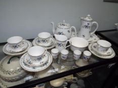 A Shelley tea set in the Chelsea pattern comprising 23 pieces.