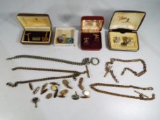 A quantity of gentleman's cufflinks some in cases and a quantity of watch chains - This lot MUST