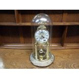 A cast metal and plated plastic Seiko mantel clock of unusual form,