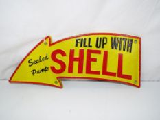 A cast iron novelty sign 'Fill up with Shell'.