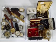 A quantity of predominantly vintage gentleman's wristwatches to include a Smiths Empire pocket