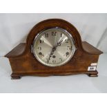 A walnut veneer Westminster chime mantel clock,
