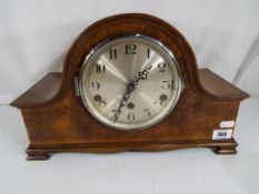 A walnut veneer Westminster chime mantel clock,