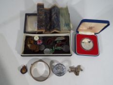 A good mixed lot to include a silver hallmarked expanding bangle, a Royal Commemorative Silver coin,