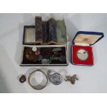 A good mixed lot to include a silver hallmarked expanding bangle, a Royal Commemorative Silver coin,