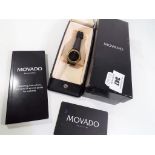 A lady's Museum wristwatch by Movado, plain black dial with single accent at the 12 o'clock,