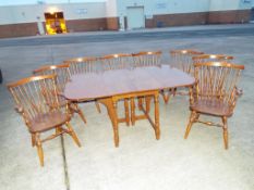 A dining table by Ethan Allen with six dining chairs and two carvers 75 cm (h)x 160 cm (w) x 106 cm