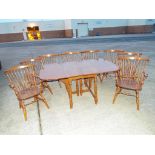 A dining table by Ethan Allen with six dining chairs and two carvers 75 cm (h)x 160 cm (w) x 106 cm