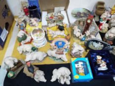 A mixed lot to include a collection of Piggin Figurines, other collectable pigs,