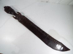 A good quality African tribal carving, approximately 90 cm length.