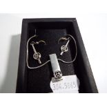 A silver Charles Rennie Mackintosh necklace and earring set.