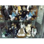 A quantity of Japanese ceramic figurines (14) - This lot MUST be paid for and collected,