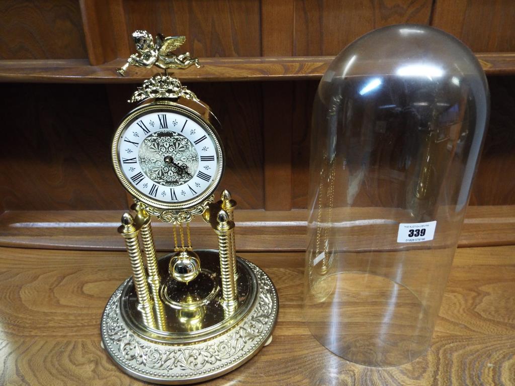 A cast metal and plated plastic Seiko mantel clock of unusual form, - Image 2 of 2
