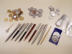 Nine writing pens to include Parker, and a small collection of pre-decimal UK and world coins,