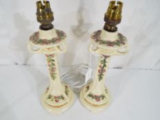 A pair of Arts and Crafts lamps.