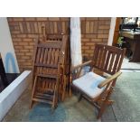 A set of six good quality wooden garden chairs with upholstered seats and a matching parasol - This