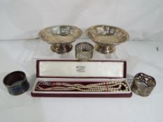 A pair of silver hallmarked pierced dishes, Birmingham assay 1849, 5 cm (h) x 11 cm (d),